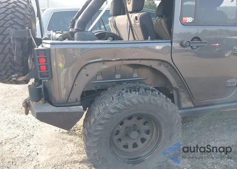 2016 Jeep Wrangler Unlimited Willys Wheeler z USA, uszkodzony, nr VIN 1C4BJWDG1GL294789